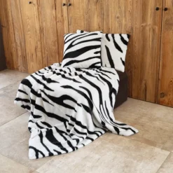 Plaid doux à motif zèbre avec dos en velours