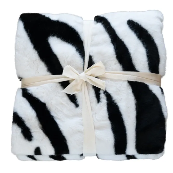 Plaid doux à motif zèbre avec dos en velours