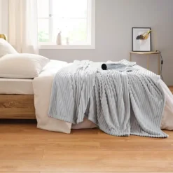 Plaid polaire à effet côtelé en 3D