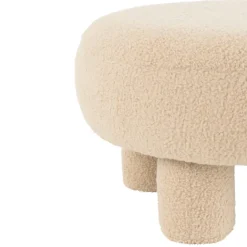Pouf rond en tissu bouclé