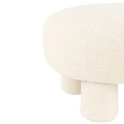 Pouf rond en tissu bouclé