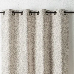 Rideau jacquard abstrait texturé à oeillets