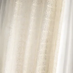 Rideau voilage broderie ton sur ton