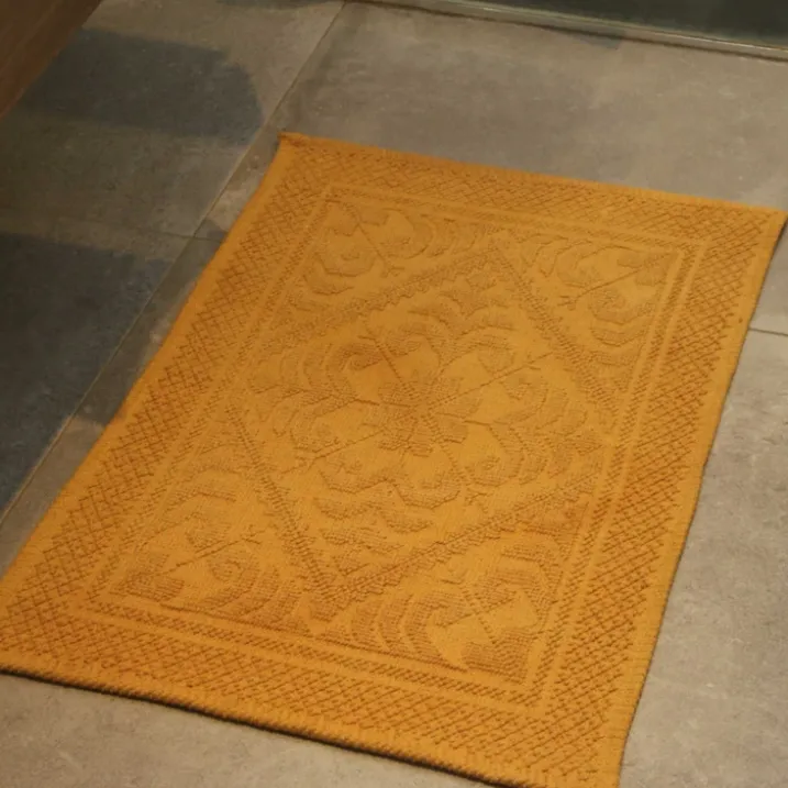 Tapis de bain à motif géométrique