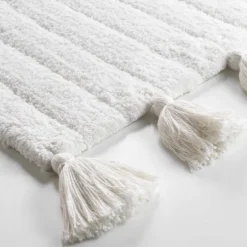 Tapis de bain uni et à pompons