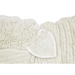 Tapis lavable en laine mouton au nez rose