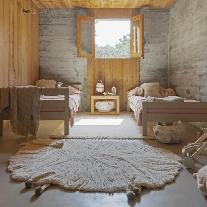 Tapis lavable en laine mouton au nez rose