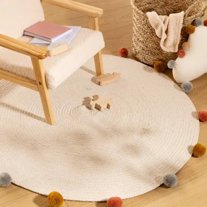 Tapis rond en coton et pompons