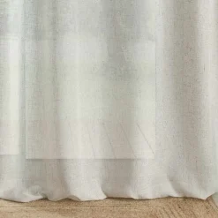 Voilage avec parement en jute et pompons