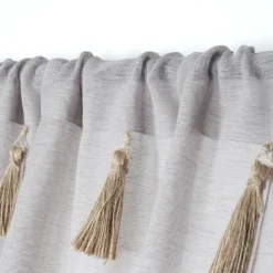 Voilage bohème à pompons en jute