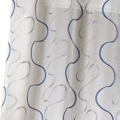 Voilage brodé à motifs ondulés