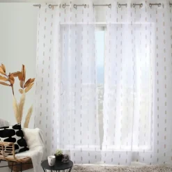 Voilage jacquard à pois ovales à oeillets