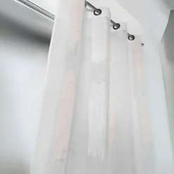 Voilage tamisant à fils coupés