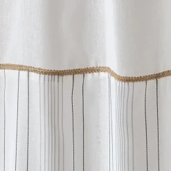 Voilage tamisant à nouettes avec parement et finition jute